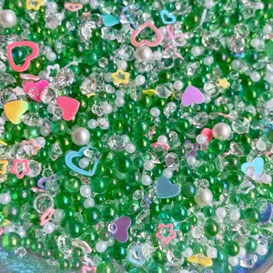 Mixed green bubble beads resin diamonds pearls heart charms for DIY crafts and slime decor.