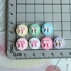 Mini cute resin bow cabochons for nail art and DIY jewelry crafts, small decorative charms.