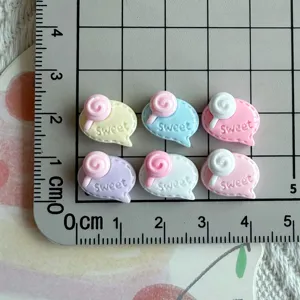 Mini resin lollipop speech bubble charm detail, cute flatback DIY nail art jewelry material.