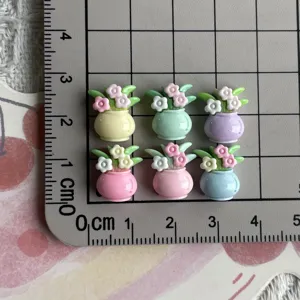 Resin flower vase cabochons detail view, perfect for DIY nail art and cute jewelry crafting.