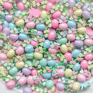 Close-up detail of colorful mini resin flower pot charms, perfect for cute DIY crafts and nail art.