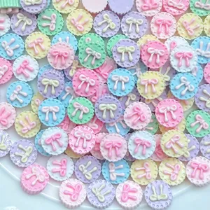Colorful resin bow flatback charms for DIY nail art and handmade jewelry craft supplies