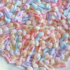Detailed close-up of colorful mini resin milk bottle charms, perfect for DIY nail art crafts.