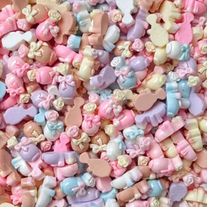 Mini pastel resin bow and flower charms detail view, perfect for DIY nail art and craft making.