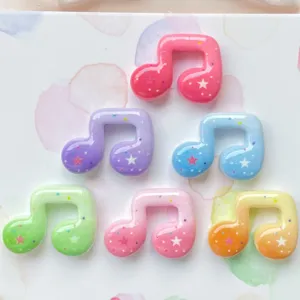 Colorful resin music note charms with star glitter, perfect for phone cases and hair clips DIY crafting.