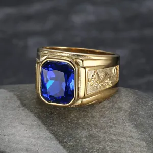 Close-up detail showing the intricate dragon carving on a men's gold ring with blue gemstone