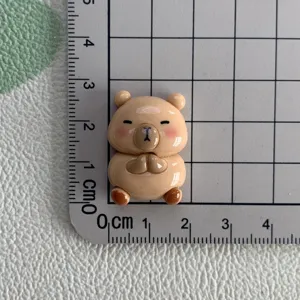 Glossy resin capybara animal charm cute cartoon phone case DIY craft jewelry accessory.