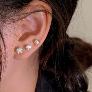 Pendientes de botón con bola brillante de plata S999 detalle, joyería elegante de mujer.