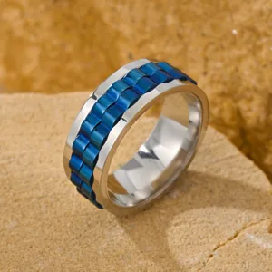 Punk style men's stainless steel rotatable watch chain ring with blue finish on stone background