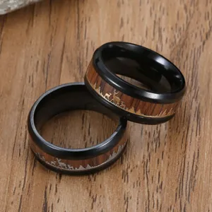 Men's black stainless steel ring with wood grain inlay and engraved deer mountain scene