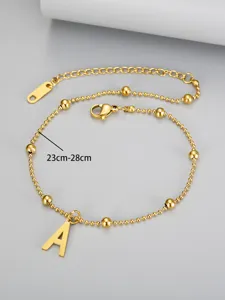 Detail view of gold-plated beaded anklet featuring a letter A pendant, length 23-28cm