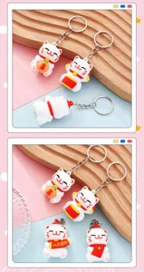 Niedliche Glückskatze Schlüsselanhänger weich PVC 3D Cartoon Anhänger für Taschen Glücksbringer.