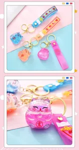 Creative quicksand lucky cat keychain acrylic oil-filled car pendant couple keyring