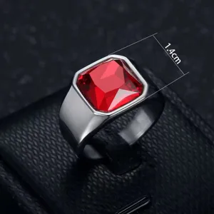 Close-up macro detail of men's stainless steel ring featuring a 1.4cm square red gemstone