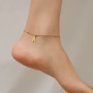18K gold plated stainless steel beaded anklet with a minimalist initial A pendant