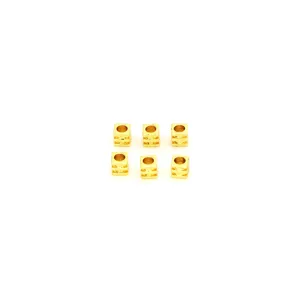 Gold square spacer beads detail view, metal DIY jewelry making accessories for bracelets.