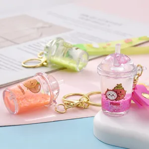 Mini porte-clés bouteille avec design de fruits mignons, accessoire idéal pour sacs et clés.
