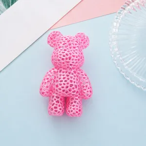 Pink hollow grid bear figurine ornament, home desktop decor, lightweight compact size.