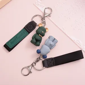 Mignon porte-clés ours en résine avec sangle en tissu pendentif de sac dessin animé