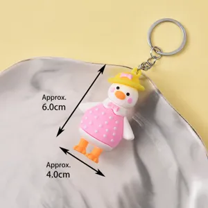 Cute cartoon duck keychain, PVC soft rubber backpack charm, stylish bag pendant for gifts.