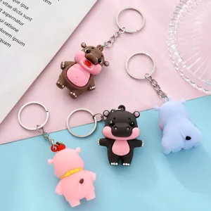 Cute cartoon hippo keychain set, creative animal bag hanging ornament metal ring toy.