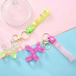 Porte-clés chien ballon mignon avec design sable mouvant huile, couleurs bonbon, bracelet silicone.