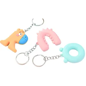 Joli ensemble de porte-clés lettres d'animaux en silicone pour clés de voiture et sacs. Cadeau idéal.