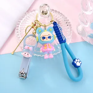 Schattige cartoon nagelknipper oorstokje sleutelhanger detail blauwe hanger accessoire.
