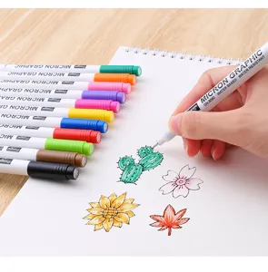 Detail view of multicolored waterproof micron graphic pens used for drawing on paper