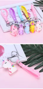 Cute cartoon silicone unicorn keychain with colorful straps, perfect bag charm and gift.