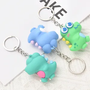Mignon dessin animé dinosaure porte-clés pendentif sac en silicone accessoire mignon