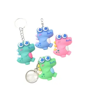 Porte-clés dinosaure cartoon mignon, pendentif de sac en silicone souple pour clés.