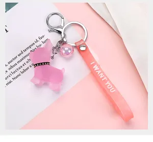 Cute cartoon French bulldog keychain, pink frosted bag charm with ring and strap accessory.