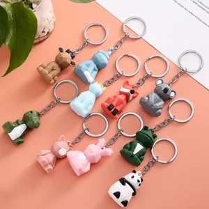Cute pixel animal PVC soft rubber keychain, fashionable geometric cartoon pendant.