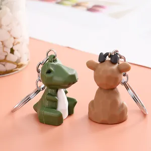 Cute pixel animal PVC keychain pendant for car keys and bags, trendy geometric style.