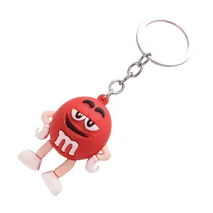 Cute cartoon character keychain with metal ring, fun red PVC pendant bag accessory gift.