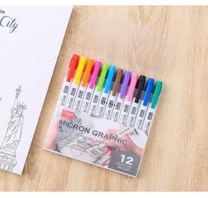 Close-up of 12-color waterproof micron graphic fineliners in a clear plastic case