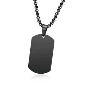 Detailed view of a minimalist matte black stainless steel military dog tag pendant necklace