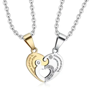 Detailed view of interlocking heart puzzle necklaces with romantic 'love' engraving