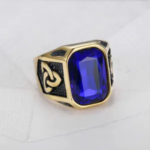 Macro view of men's Viking ring with large blue gemstone and Celtic knot detail