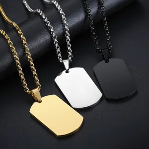 Close-up detail view of military dog tag necklaces in gold, silver, and black finishes