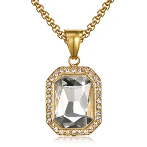 Detailed view of square clear crystal pendant with pavé diamond halo on gold chain