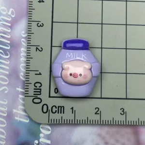 Purple pig milk carton resin DIY charm detail view, cute cabochon for phone case and crafts.