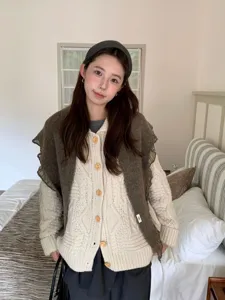 Cozy autumn winter knitted shawl cardigan set, soft skin-friendly fabric, elegant detail view.