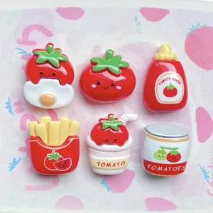 Cute cartoon tomato resin charms detail, perfect for DIY crafts and phone case decoration.