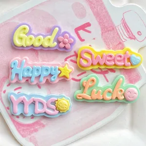 Resin letter charms DIY craft accessories for cute phone cases and custom hair clips.