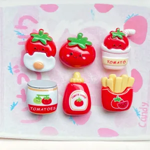 Cute cartoon tomato resin flatback charms, ideal for DIY phone case decor and crafts.