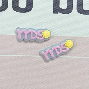 Resin jelly letter charm detail shot, cute DIY phone case and shoe accessory decoration.