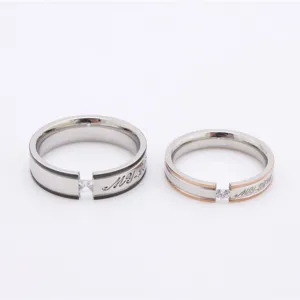 Exquisite stainless steel couple rings set with zircon and My Love engraving on band.