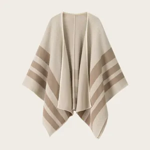 Stylish striped knitted poncho cape cardigan for women, cozy winter outerwear shawl top.